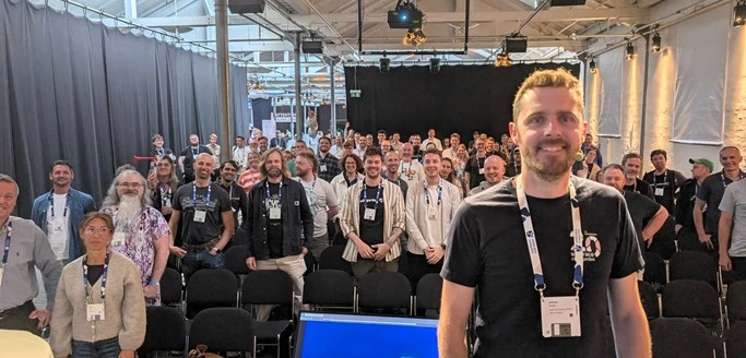 James Hobbs at Codegarden with people attending the Umbraco hosted event