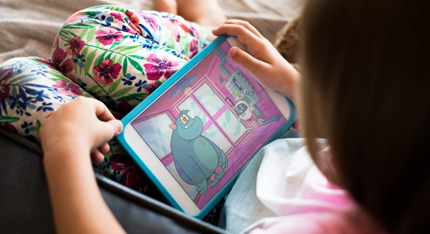 Child on their tablet playing a BBC game
