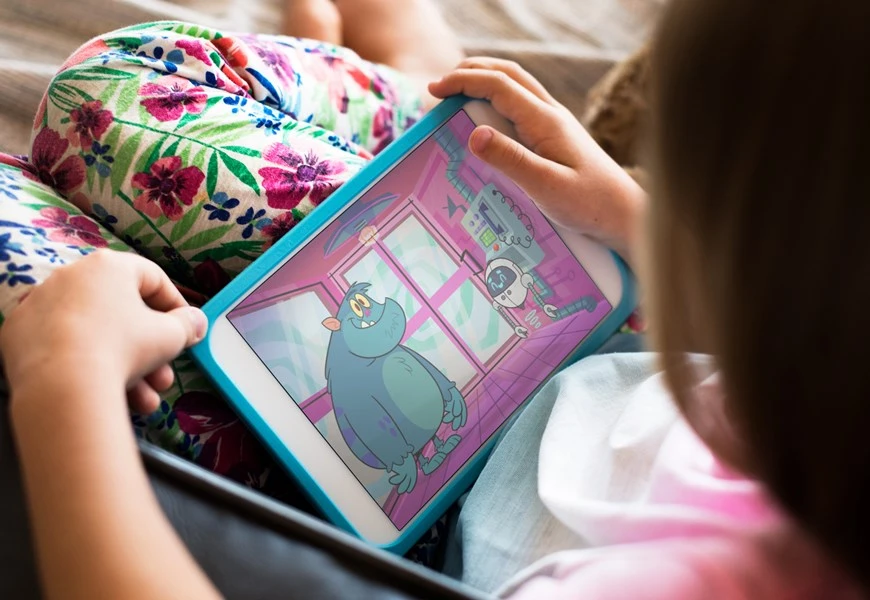 Child on their tablet playing a BBC game