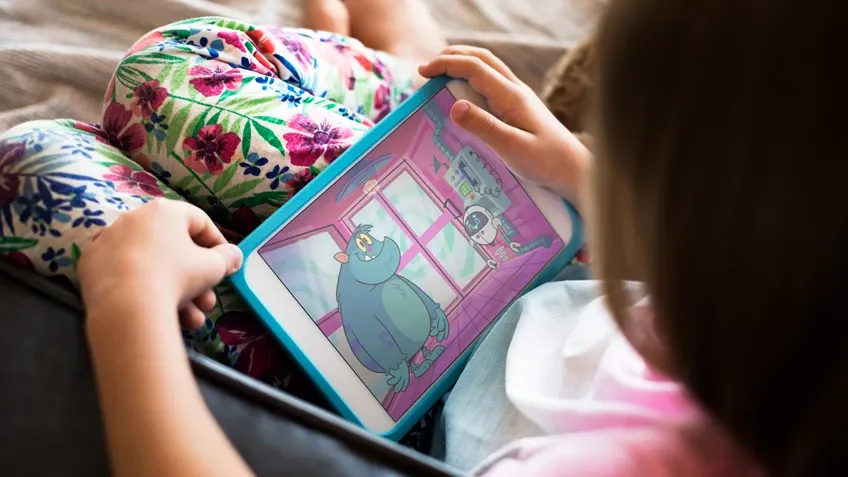Child on their tablet playing a BBC game