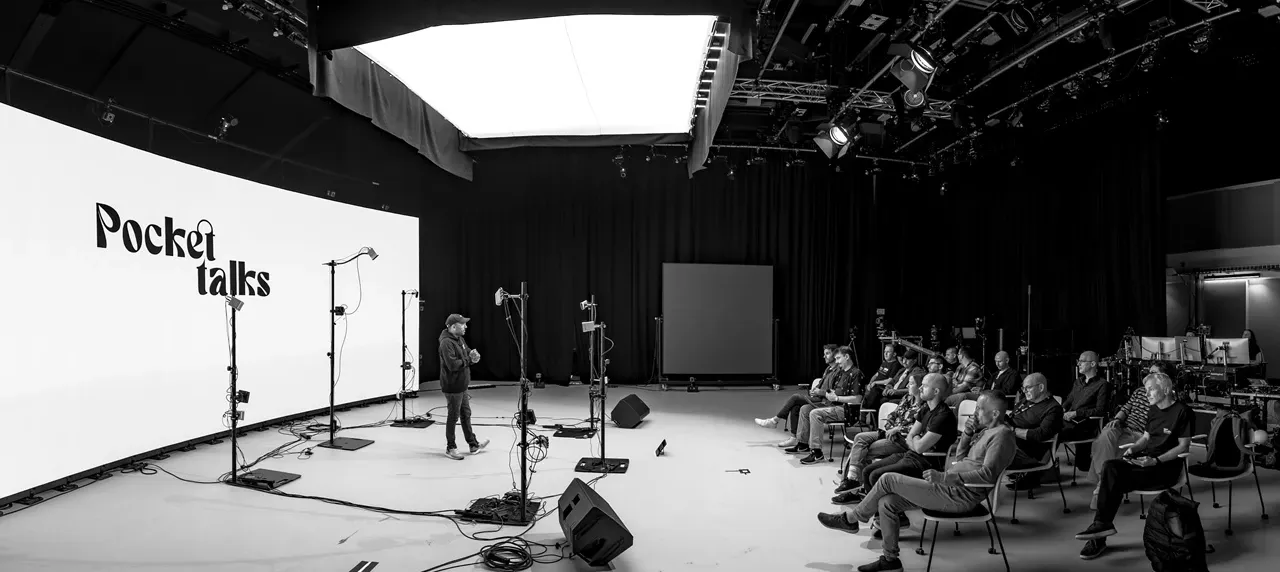 Person on stage with audience