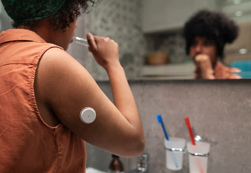 Diabetic Woman Wearing Glucose Monitor