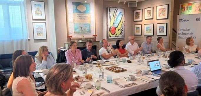 Guests around a table at the lunch and learn event